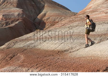Backpacker Girl Exploring The Mountains. Backpacker Girl Tourist Exploring The Xizi Mountains , Azer