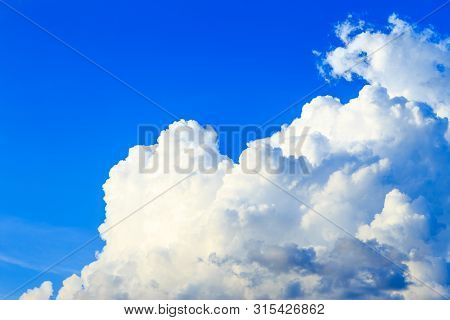 Blue Sky Background And White Clouds In Sunny Day With Skyspace