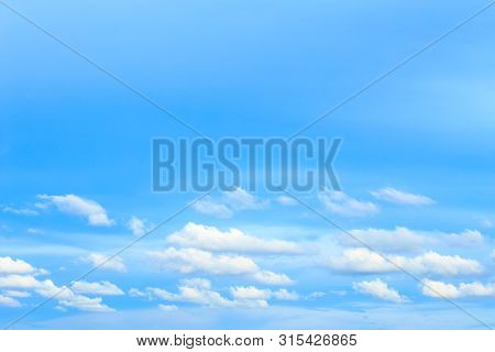 Soft Blue Sky Background And White Clouds In Sunny Day