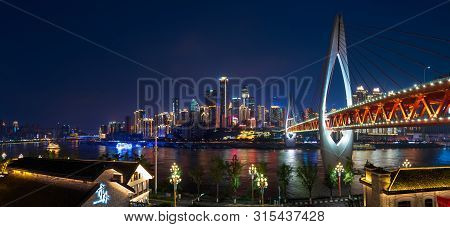 Chongqing, China - July 24, 2019: Panoramic View Of Chongqing Skyline And Chaotianmen Bridge Over Ya