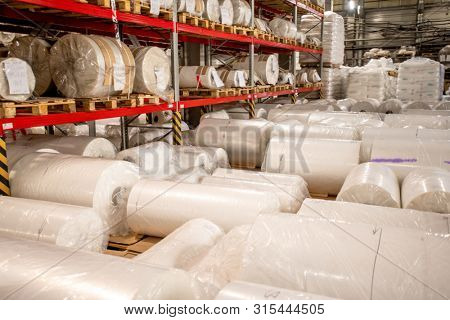 Rolled, packed and wrapped large bobbins of newly produced polyethylene film
