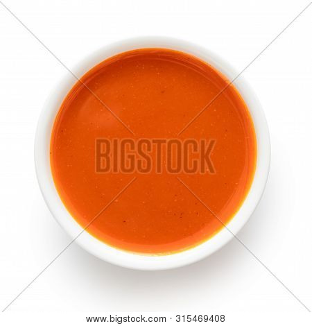 Peri Peri Chilli Sauce In A White Ceramic Bowl Isolated On White From Above.