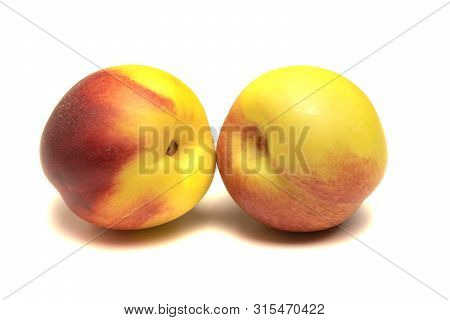 Nectarines Fruit Lie On A White Background
