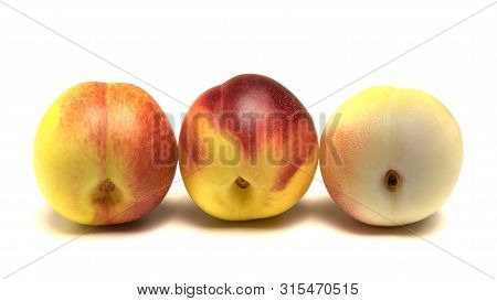 Nectarines Fruit Lie On A White Background