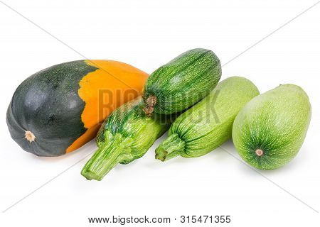 Different Fresh Raw Vegetable Marrows And Zucchini On A White Background