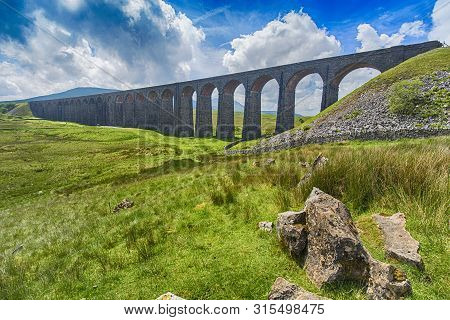 View Of Large Victorian Viaduct In Rural Countryside Scenery