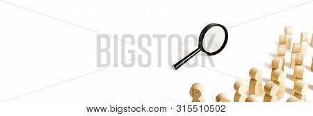 A Crowd Of People Looking At The Magnifying Glass. Search And Tracing Concept, Find Out The Truth. F