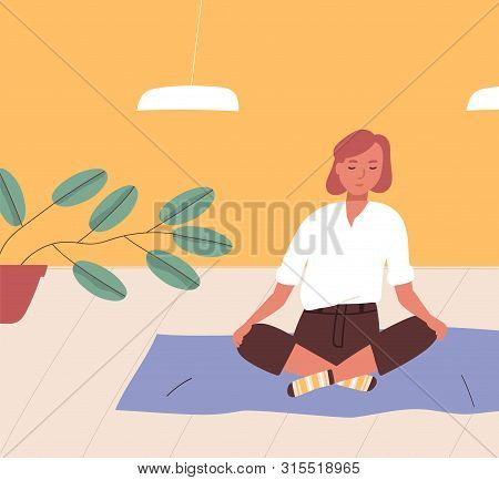 Girl Sitting Cross-legged On Floor And Meditating. Young Woman Practicing Yoga, Buddhist Meditation,