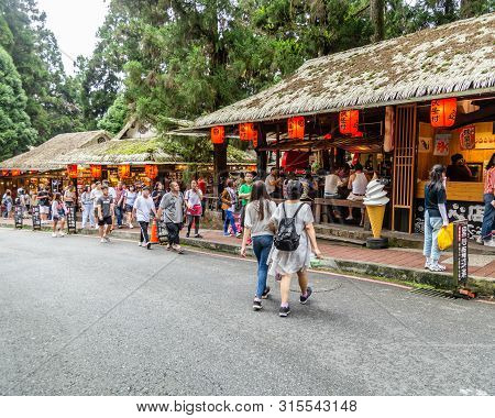 Travelers At Xitou Monster Village