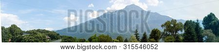 Fantastic View Of Mountains And Forest On A Sunny Summer Day. District Of Como Lake, Colico, Italy, 