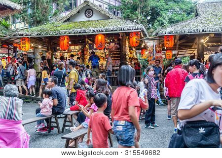 Travelers At Xitou Monster Village