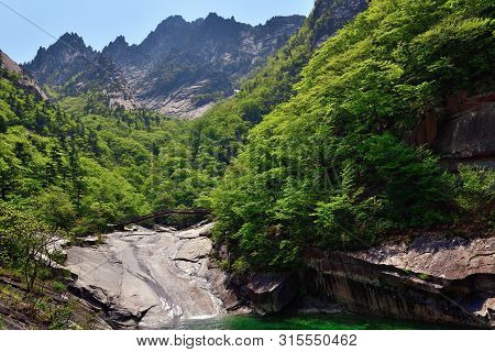 Diamond Mountains. Dprk. Mt.kumgang Trekking Route. Singye Stream Between Rocks And Jipson Peaks On 