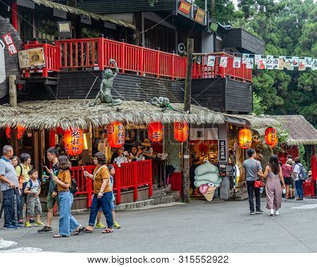 Travelers At Xitou Monster Village
