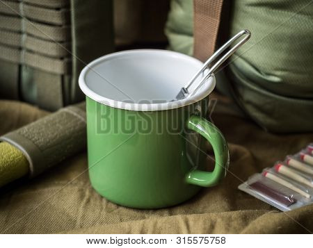 Modern Outdoor Survival Kit In Green Tones