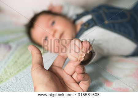 Son Stretches To His Father. Childs Love For Family