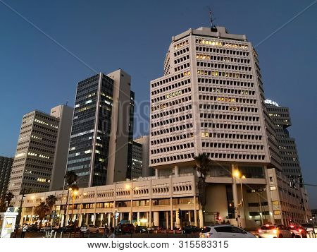 Tel Aviv, Israel - June 26, 2019:  Evening In Tel Aviv. Tel Aviv Promenade And Beit Textil Gibor Hou