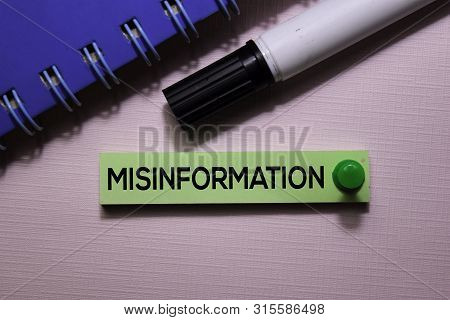 Misinformation Text On Sticky Notes Isolated On Office Desk