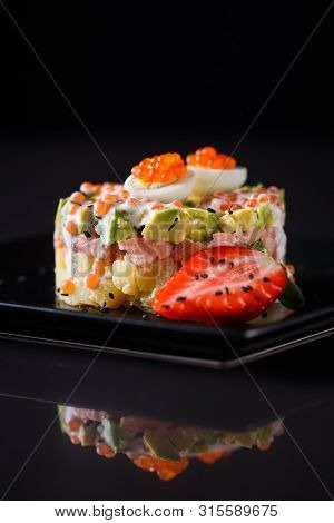 Round Salad Made Of Red Fish Potato And Avocado