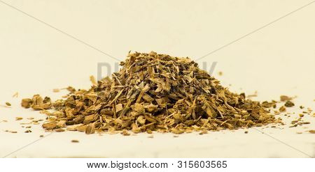 Crushed Oak Bark In Bulk On A Light Background