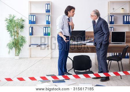 Forensic investigator investigating theft in the office