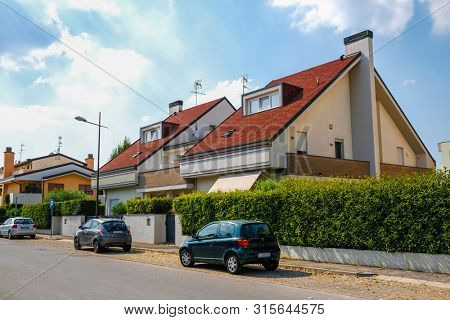 Rovigo, Italy - July, 7, 2019: cars parked on the street in Rovigo, Italy