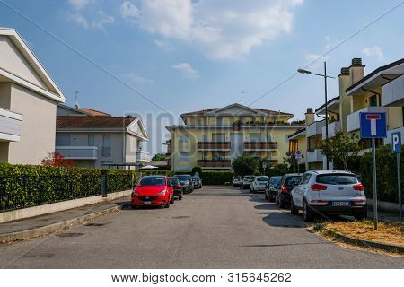 Rovigo, Italy - July, 7, 2019: cars parked on the street in Rovigo, Italy