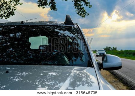 Rovigo, Italy - July, 28, 2019: car on a country road in Rovigo, Iyaly