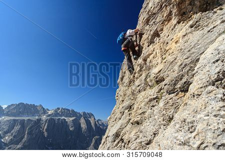 Dolomiti - Female Climber On Cir V Via Ferrata, Gardena Pass, Italy