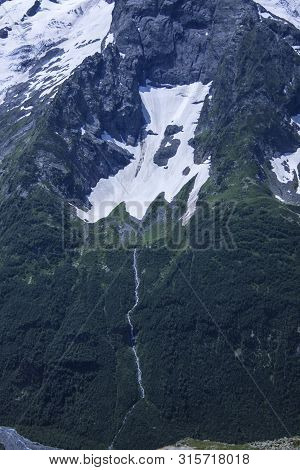 Vertical Beautiful Panorama Of The Caucasus Mountains.