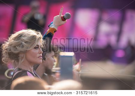 Woman Vocalist Singing Live