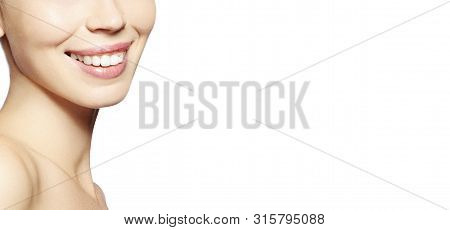 Beautiful Part Of Face Young Woman With White Teeth On White Background. Happy Smile. Wellness And T