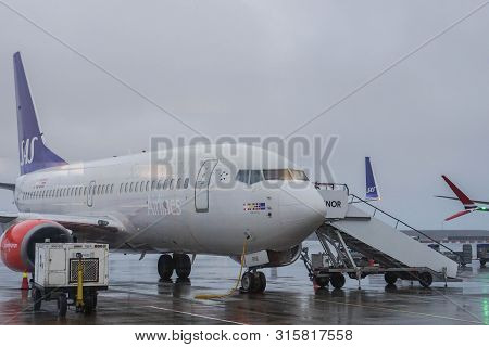 Oslo / Norway - 10 December 2018: Sas Airlines Arrived At Oslo Airport In Stormy Day