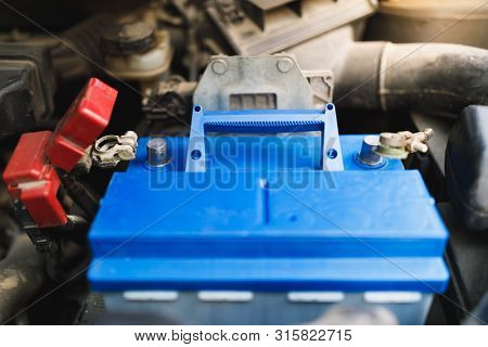 new lead-acid automotive electric battery replacement in old car