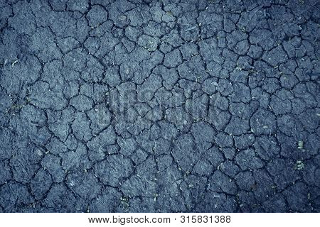 Cracked Dry Earth Soil After No Rain Water Longtime, Abstract Sad Dry Background