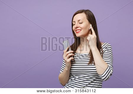 Young Brunette Woman Girl In Casual Striped Clothes Posing Isolated On Violet Purple Background Stud