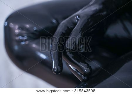 Man In The Latex Rubber Black Catsuit With Gasmask