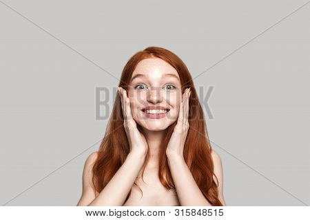 Keep Smiling Portrait Of Cheerful Pretty Young Redhead Lady Smiling At The Camera While Standing Aga
