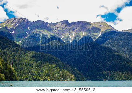 Beautiful Mountain Lake Ritsa. Ritsa Lake In The Mountains Of The Caucasus, In The Northwestern Part