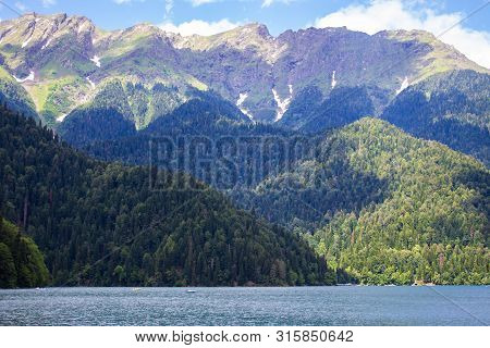 Beautiful Mountain Lake Ritsa. Ritsa Lake In The Mountains Of The Caucasus, In The Northwestern Part