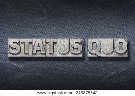 Status Quo - Ancient Latin Saying Meaning «current Condition» Made From Metallic Letterpress On Dark