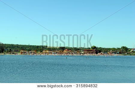 People Bathe In A Salt Lake At A Balneological Resort In Slavyansk Near Donetsk, Ukraine, June 15, 2