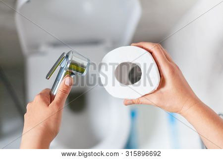 Bidet Shower Or Toilet Paper. Close Up.