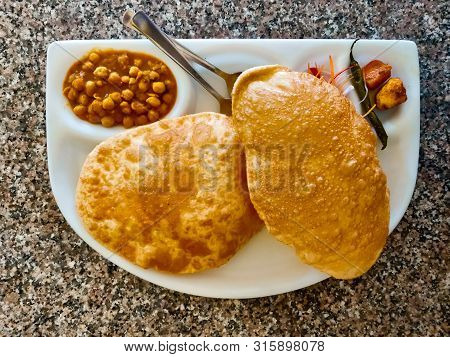 Puri Tarkari Or Indian Fried Bread With Vegetables