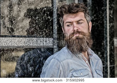 Masculinity And Manliness. Confident Posture Of Handsome Man. Guy Masculine Appearance With Long Bea