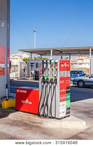Valencia, Spain - February 19, 2019: Cepsa Petrol Pump Nozzles On A Gas Service Station In Valencia,