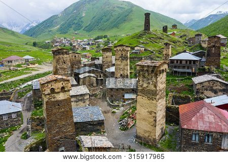 View Of The Ushguli Village At The Foot Of Mt. Shkhara. Picturesque And Gorgeous Scene. Rock Tower T