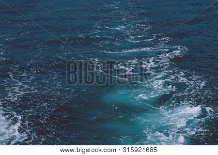 Creative Layout Made Of Clear Sea Watersurface With Kelvou Jet, Bubbles And Waves On Water Surface W