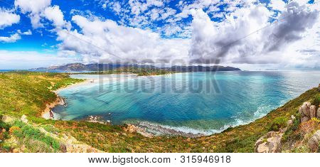 Fantastic View On Lagoon Of Porto Giunco With Turquoise Water And Old Tower. Location: Villasimius, 