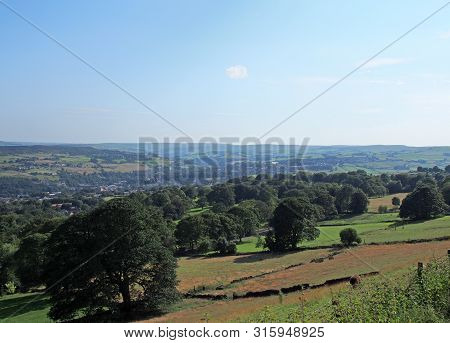 A Scenic View Of West Yorkshire Countryside With The Town Of Sowerby Visible At The Bottom Of The Ca