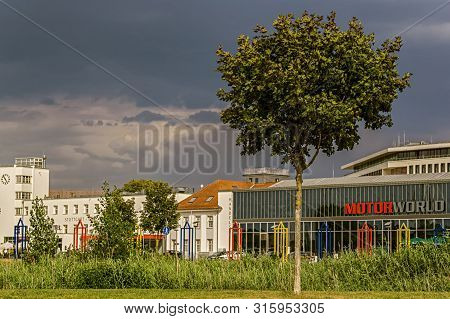 Boeblingen,germany - August 05,2019:flugfeld This Is A Small Tree In Front Of The Modern Car Park Mo